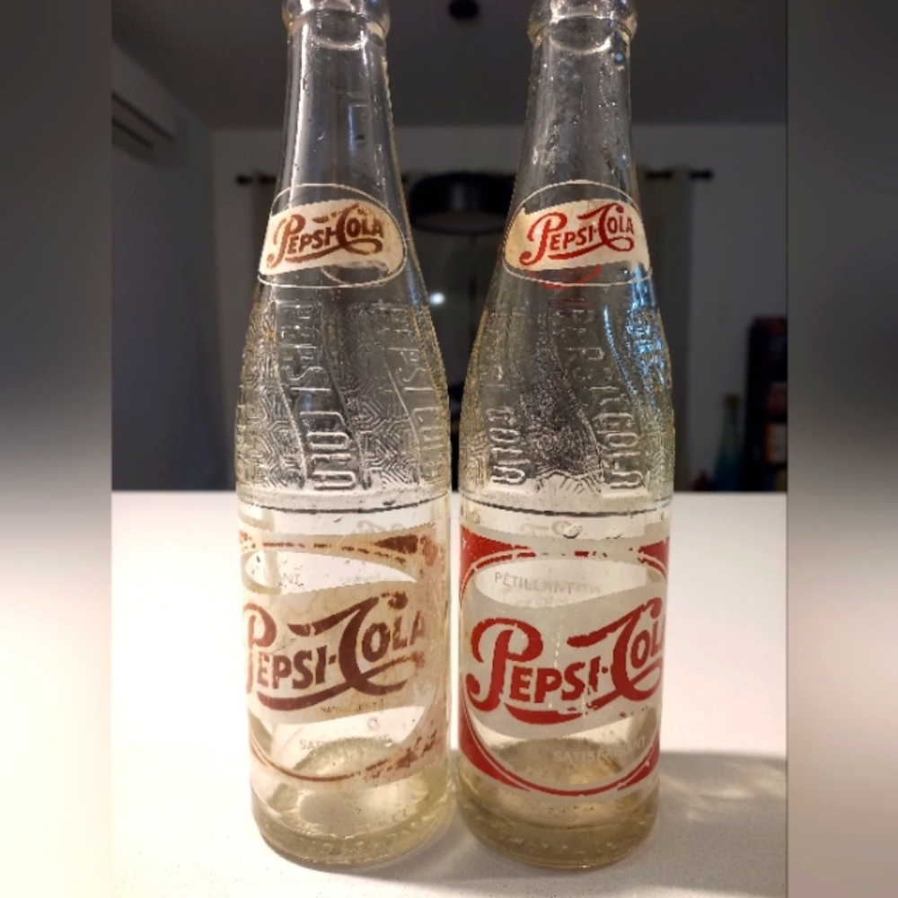 2 VINTAGE 10OZ PEPSI COLA BOTTLES 1955 / 1956 NO CRACKS IN USED CONDITION.